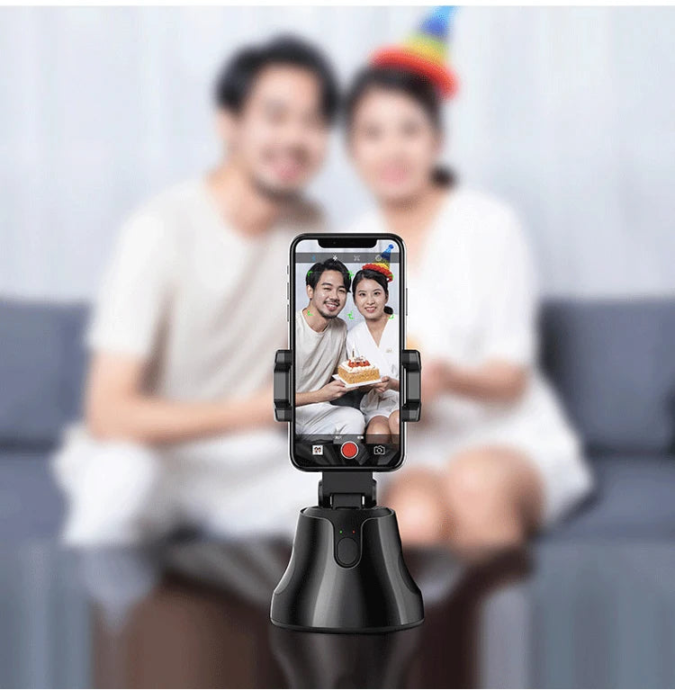 Smartphone with a selfie stick displaying a photo of two people, with text about intelligent shooting modes.